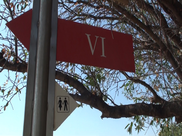 Figure 15. Associative ISO symbol for “bathroom” as used in a sign at Troy.