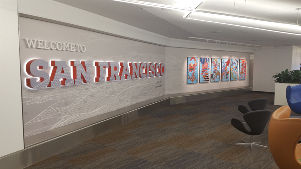 The Strangerhood Series on display at San Francisco International Airport.
