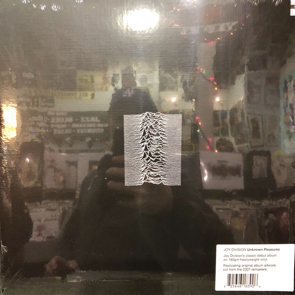 Figure 1. Unknown Pleasures in its natural habitat, the record store. The References and Further Reading section contains links to excellent histories of the album art. Photo by author.