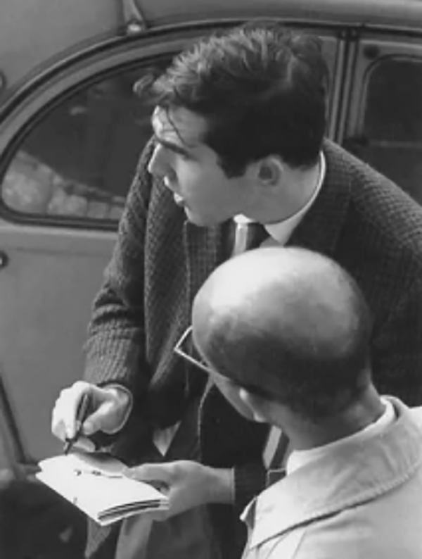 Figure 4. Stanley Brouwn (foreground) and a collaborator in the 1960s. Taken by Igno Cuypers. Source: https://www.are.na/travess-smalley/stanley-brouwn-this-way-brouwn-1960-1964.