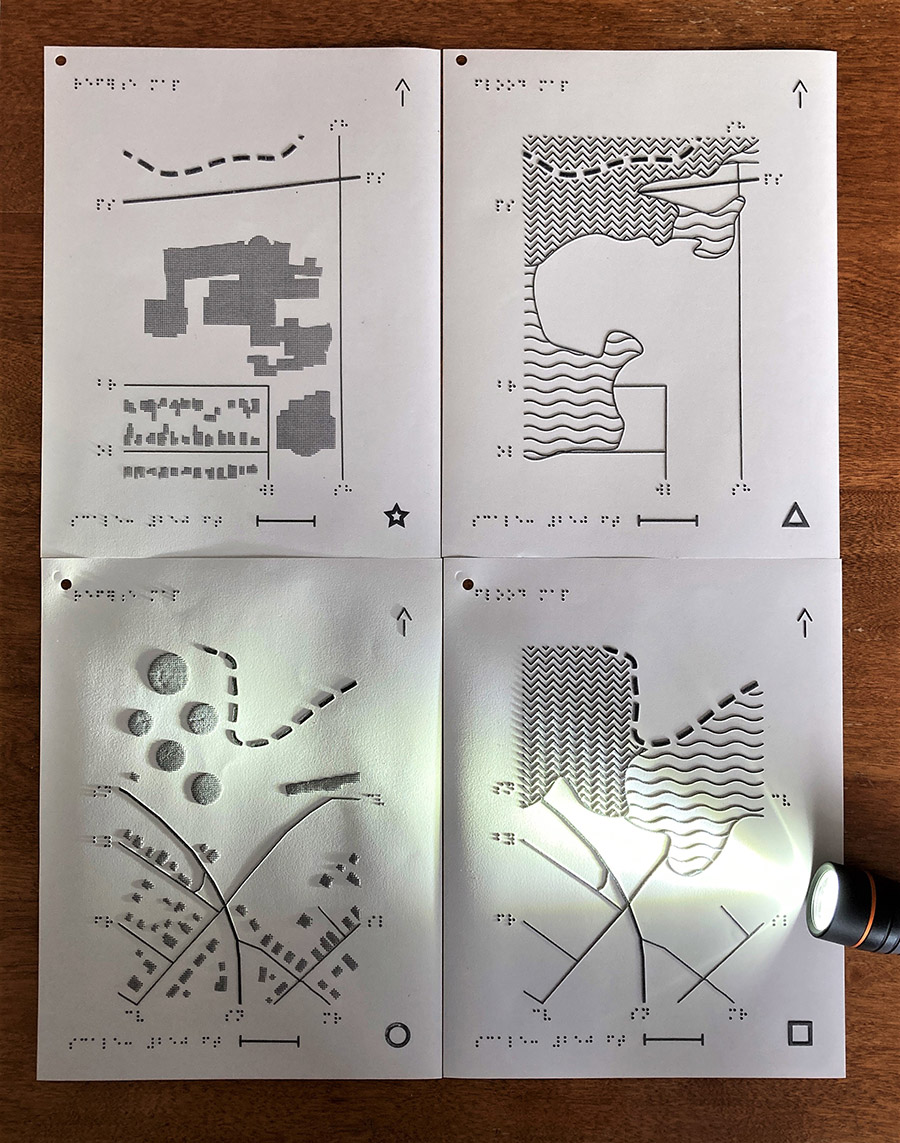 Figure 7. Printed Quincy and Pasadena maps, with flashlight used to emphasize symbol elevation.
