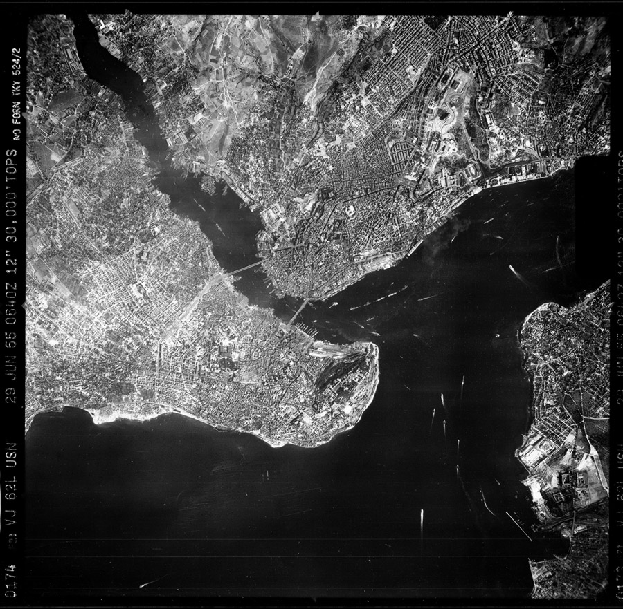 Figure 1. Representative sample of the historical aerial photographs in the collection, this one captured in late June 1955 above the historical peninsula of Istanbul, and surroundings, with north near the top. Note the camera-printed label shown here along the left side of the frame.