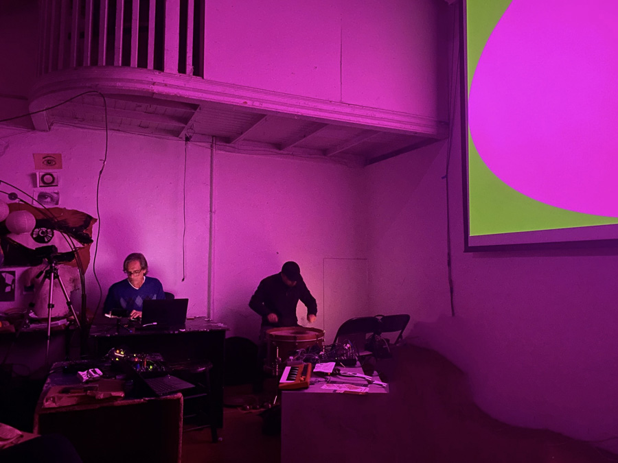 The author performing with Kevin Corcoran, textural percussion & manipulated field recordings, at Other Cinema, San Francisco, California, November 5, 2022. Photograph by Mai Adachi.
