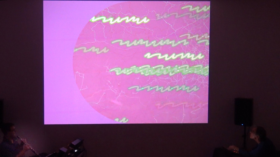 The author performing with Kyle Bruckmann, oboe and electronics, at Shapeshifters Cinema, Oakland, California, September 25, 2022.