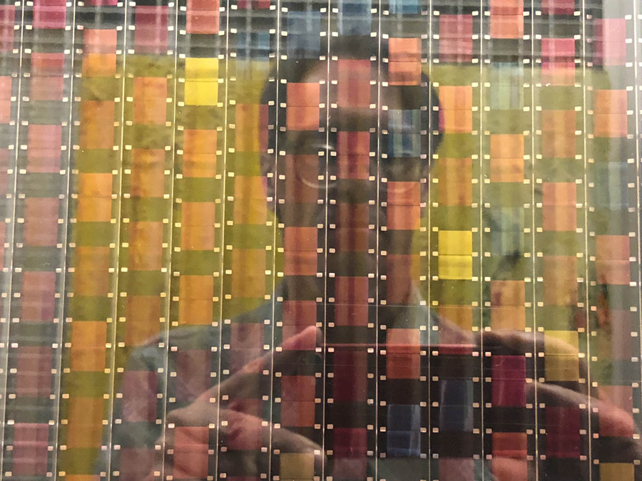 The author reflected in Paul Sharits’s Frozen Film Frame Series, c. 1971–76, Burchfield Penney Art Center, Buffalo, New York, October 22, 2018.