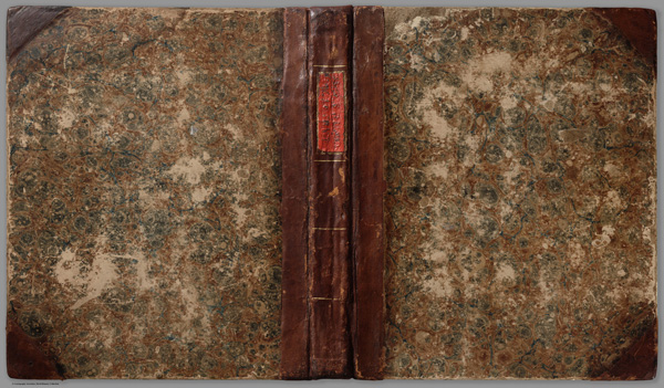 The covers of the atlas. Even the title label on the spine is raised and embossed, saying “Atlas of The United States.”
